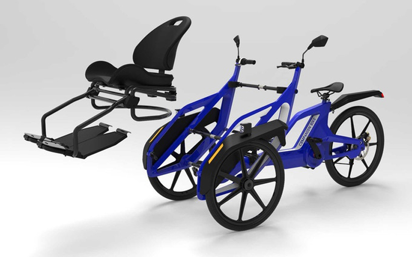 the companion bike lets wheelchair users ride in tandem