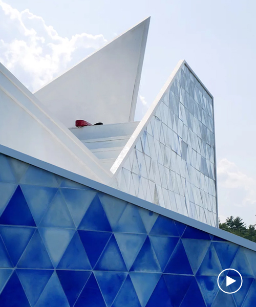 thermochromic tiles of recycled HDPE clad the 'iceberg' diving platform by bulot+collins