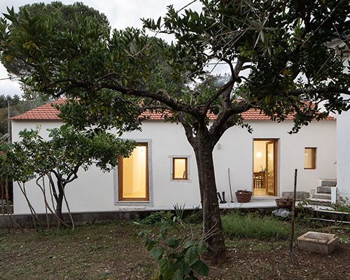 'ti clara' farmhouse in portugal sees a minimalist revitalization by espaço P2 architects