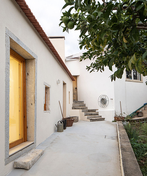 'ti clara' farmhouse in portugal sees a minimalist revitalization by espaço P2 architects