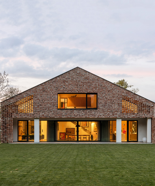 wrzeszcz architekci uses bricks from an old barn to build new house in poland
