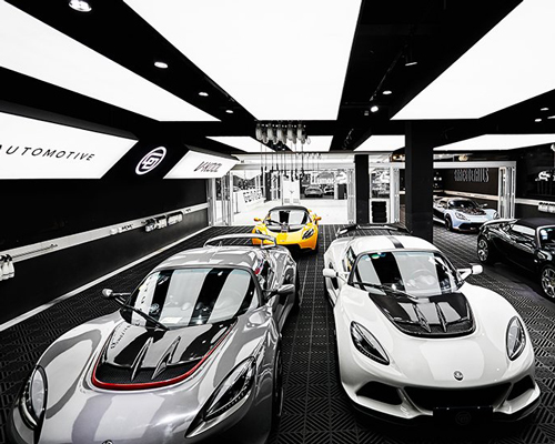 mirrored surfaces and polycarbonate panels adorn XU studio's car showroom in shanghai