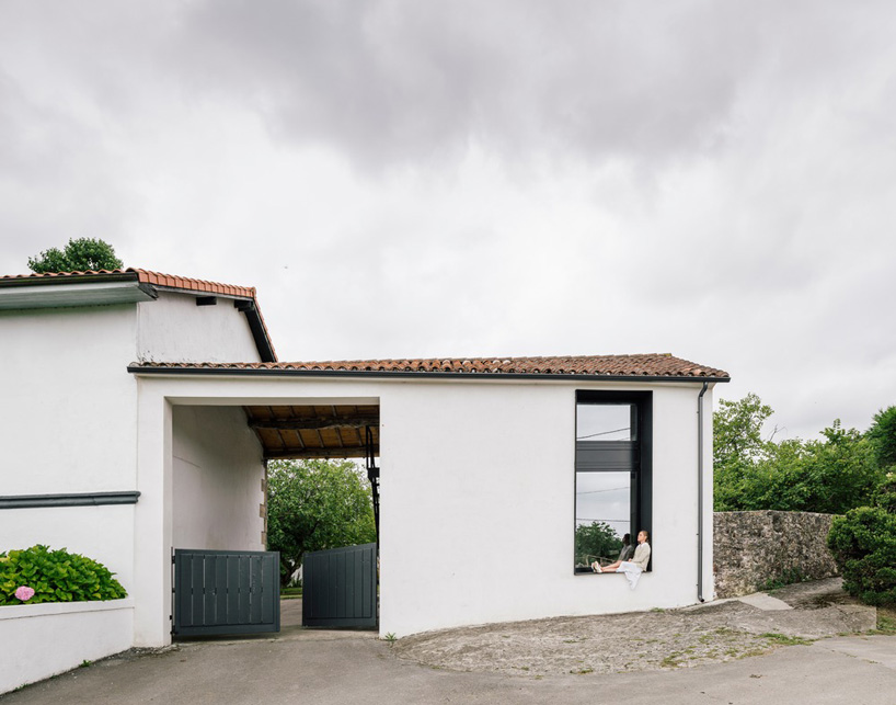 zooco estudio converts former stable into seasonal house in güemes, spain