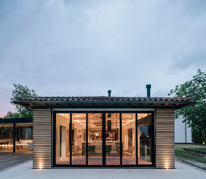 zooco estudio converts former stable into seasonal house in güemes, spain