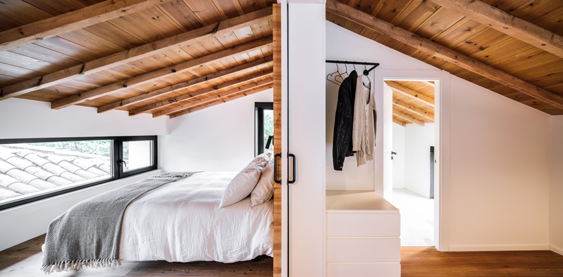 zooco estudio converts former stable into seasonal house in güemes, spain