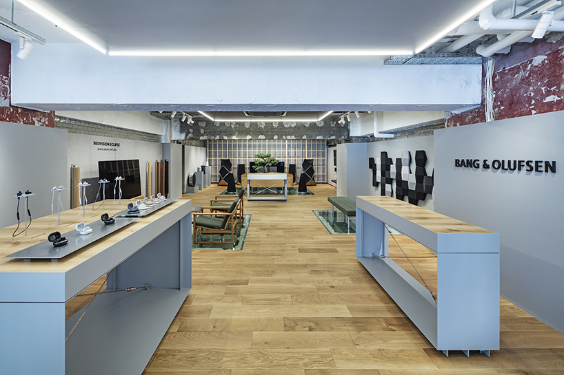 DDAA embeds speakers in glass flooring within bang & olufsen flagship store in tokyo