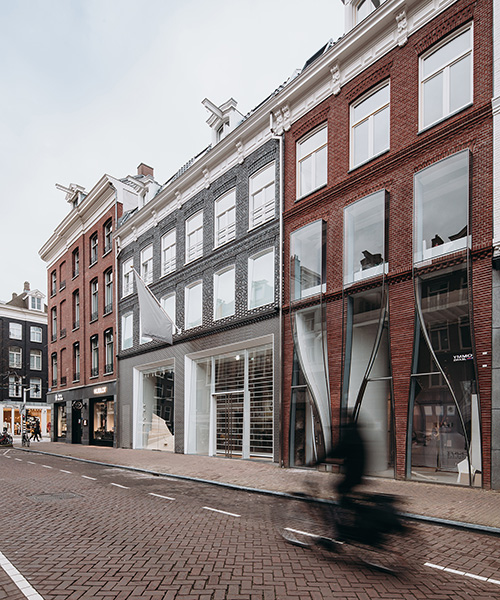 UNStudio adds pixelated glass + stainless steel façade to louis vuitton store in amsterdam