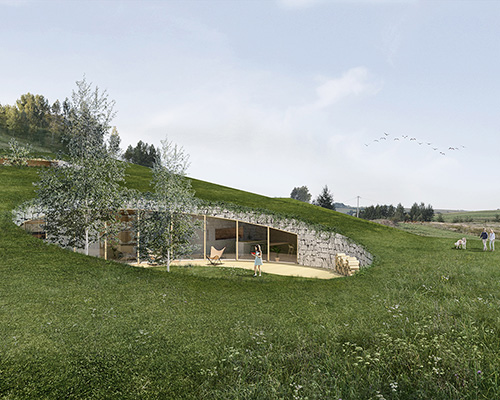 adrian kasperski weaves house into the hills of polish landscape
