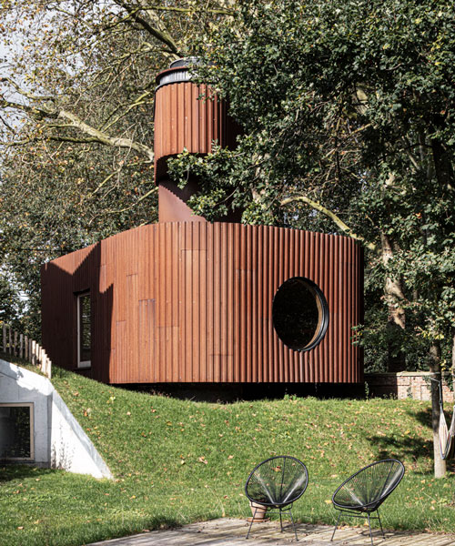 corten steel wraps a sculptural guesthouse in belgium designed by atelier vens vanbelle