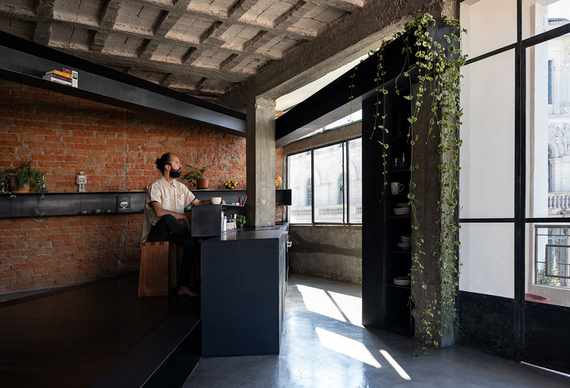 exposed concrete columns furnish aquiles jarrín's 'forest' apartment renovation in quito designboom