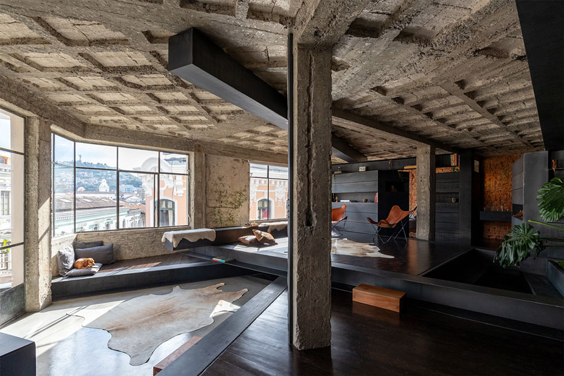 exposed concrete columns furnish aquiles jarrín's 'forest' apartment renovation in quito designboom