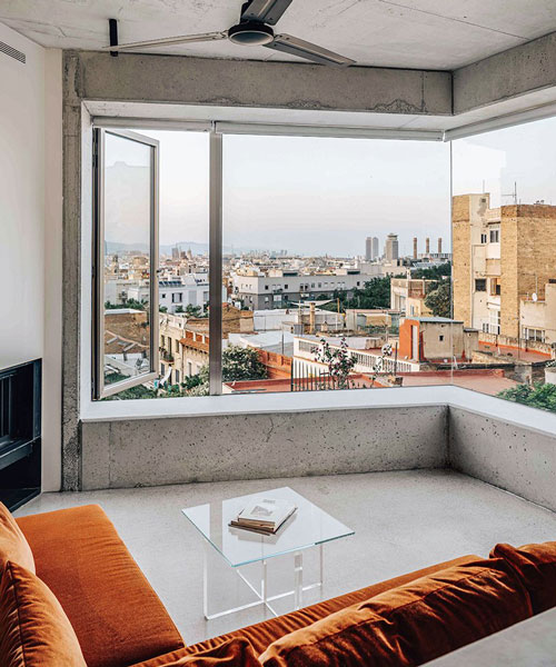 barbara appolloni converts a garage into a stylish 'shoebox' apartment in barcelona