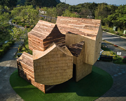 the boolean birdhouse in taipei comprises five stacked 'house-shaped' volumes
