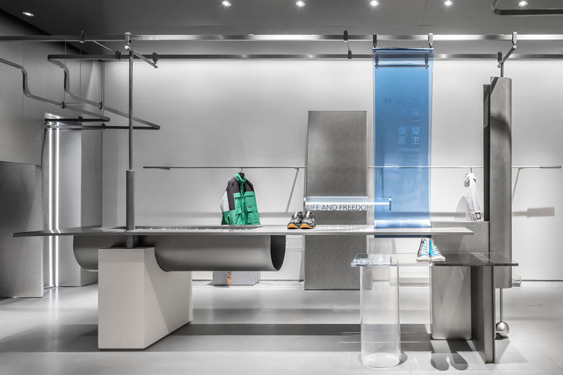 DAS lab wraps cool stainless steel around a concept store in shijiazhuang, china designboom