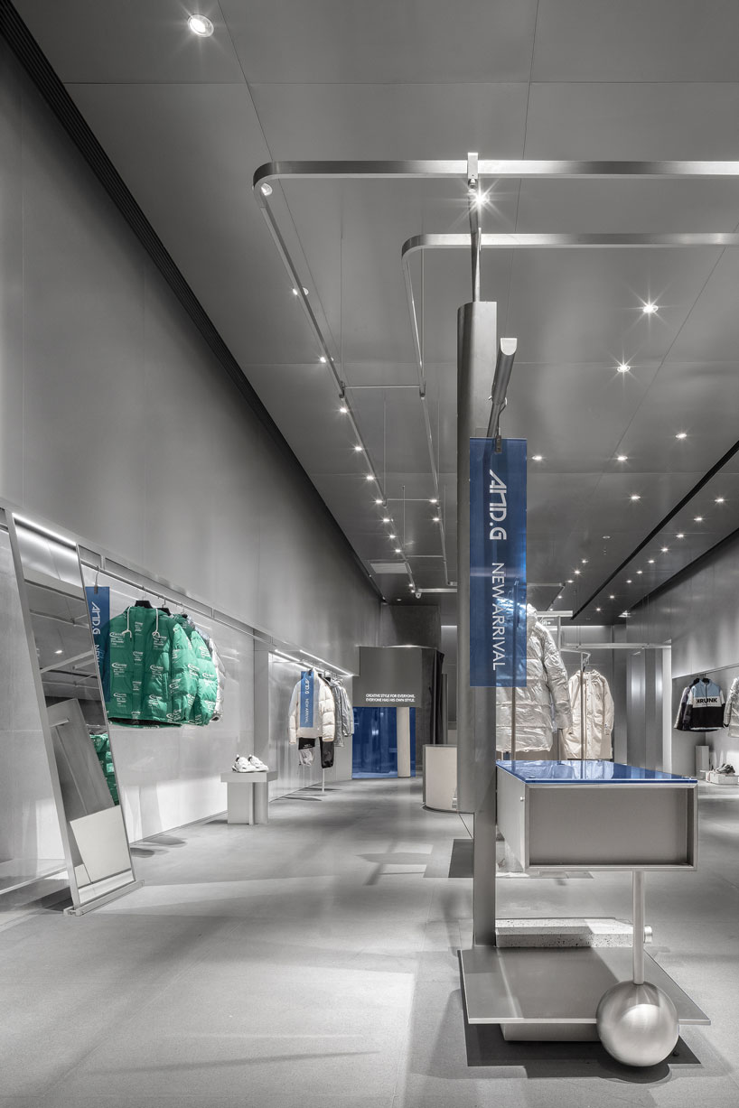 DAS lab wraps cool stainless steel around a concept store in shijiazhuang, china designboom