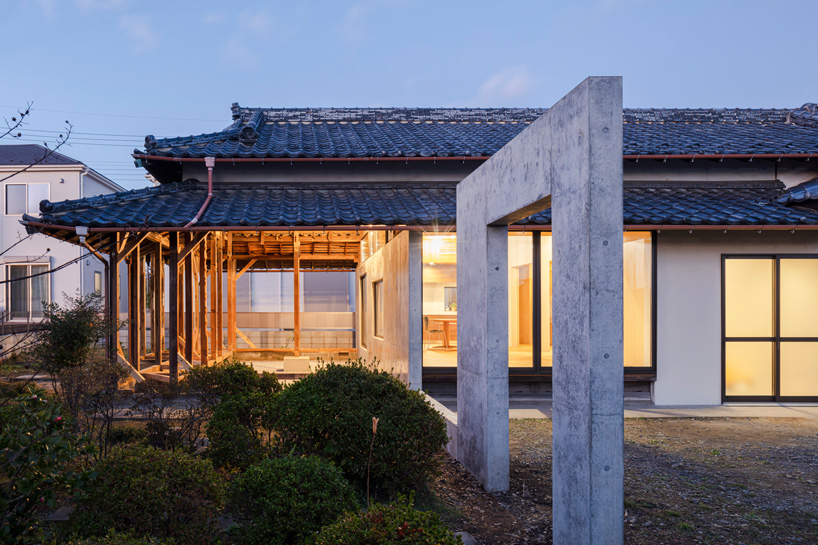 DOG scales down house topped with traditional tile roof in kawagoe, japan