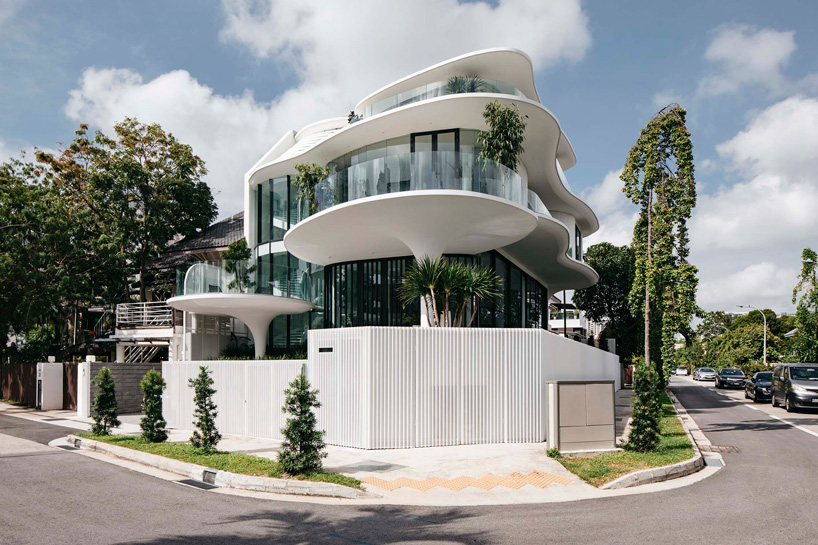curved geometries define EHKA studio's sculptural 'jalan seaview' house in singapore