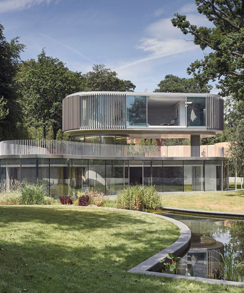 curved glass façades articulate eldridge london's 'house in coombe park'