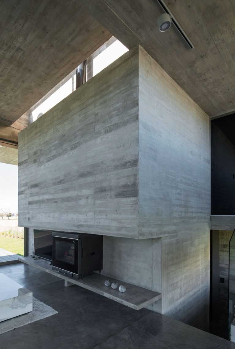 exposed concrete articulates escobar house by luciano kruk in argentina