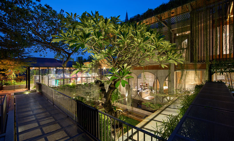 lush greenery envelops RAW architecture's multi-purpose complex in indonesia
