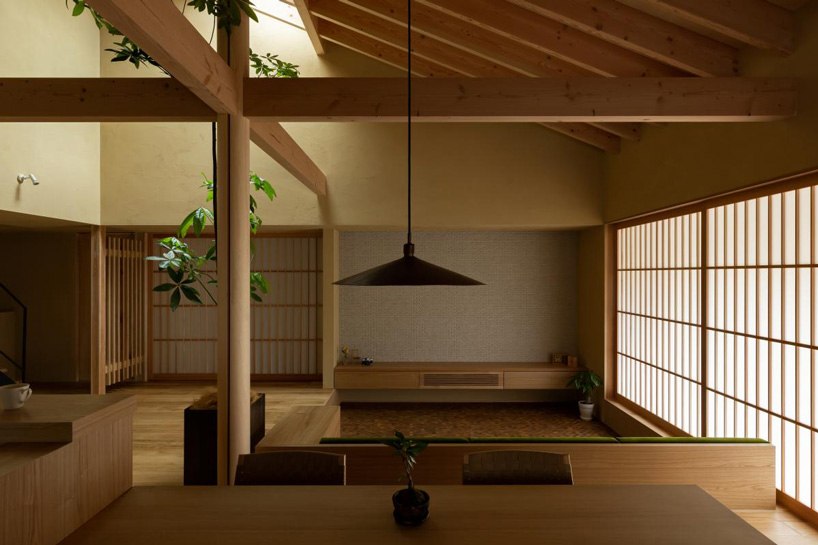 gabled roof with extended eaves tops hearth architects' hikone house in japan