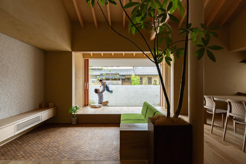 gabled roof with extended eaves tops hearth architects' hikone house in japan