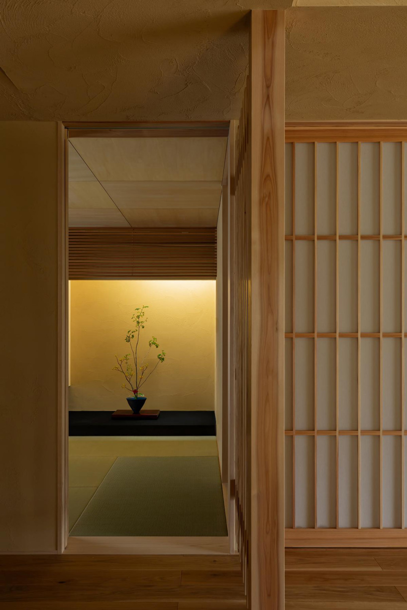 gabled roof with extended eaves tops hearth architects' hikone house in japan