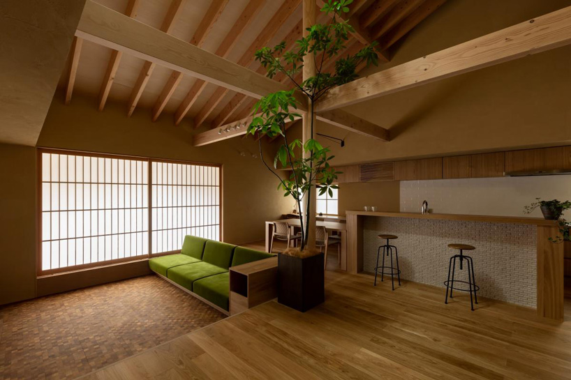 gabled roof with extended eaves tops hearth architects' hikone house in japan