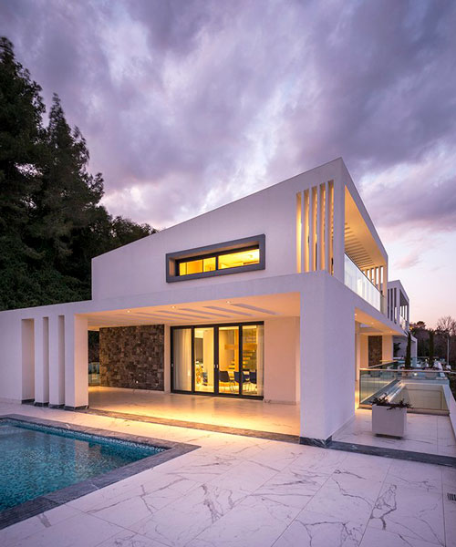 officetwentyfivearchitects designs two idyllic beachside villas in greece