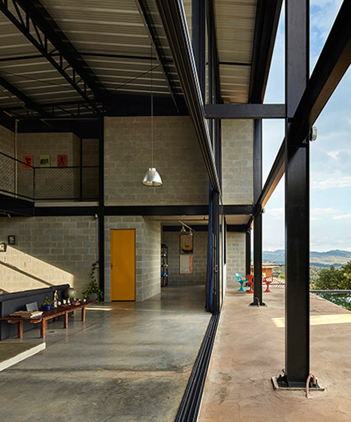 'casa galpao' by marcos franchini in brazil combines steel framing and exposed concrete