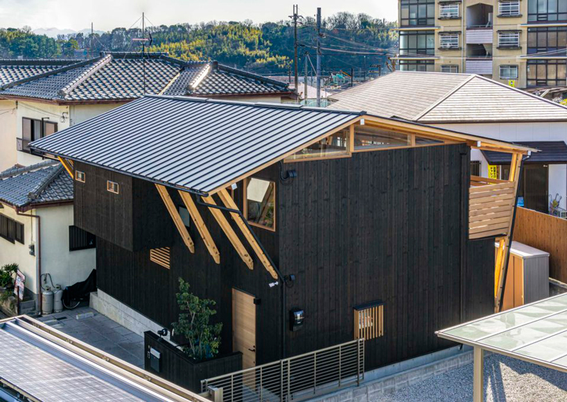 masaru takahashi clads family house 'G' in charred wood exterior in japan