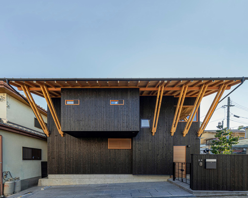 masaru takahashi clads family house 'G' in charred wood exterior in japan