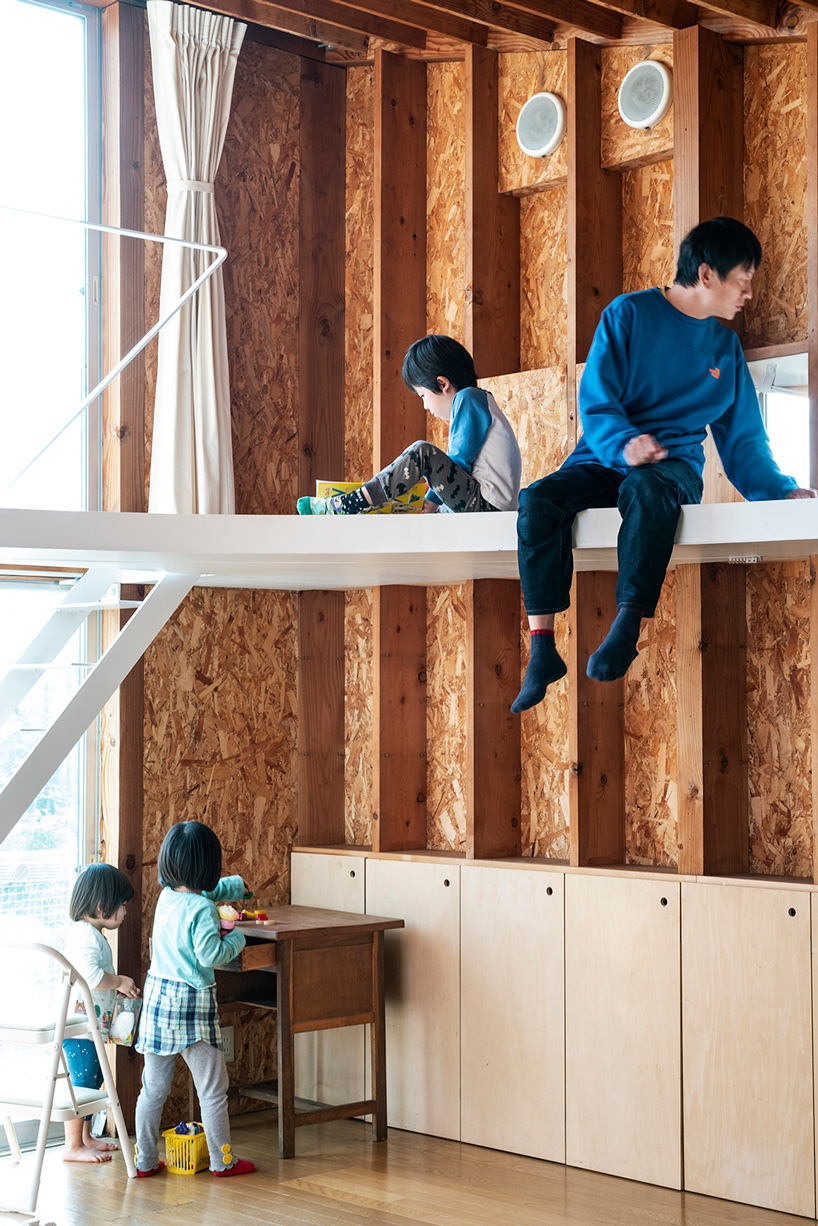 mtka adds inhabitable elliptical void below the roof of this house in tokyo