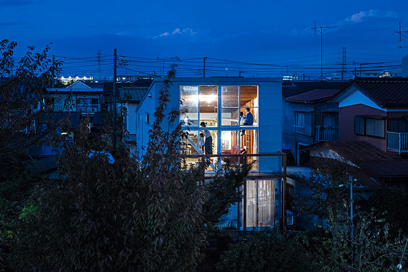 mtka adds inhabitable elliptical void below the roof of this house in tokyo