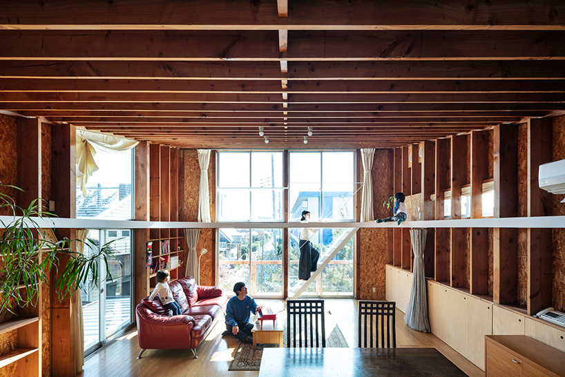 mtka adds inhabitable elliptical void below the roof of this house in tokyo