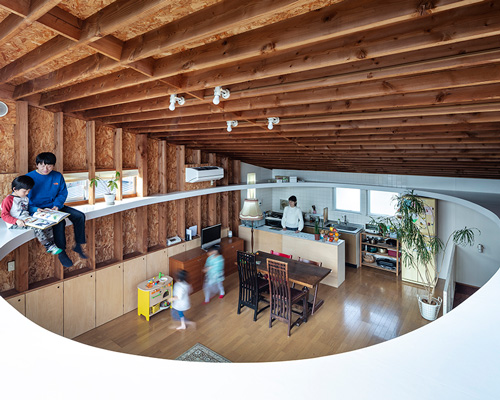 mtka adds inhabitable elliptical void below the roof of this house in tokyo