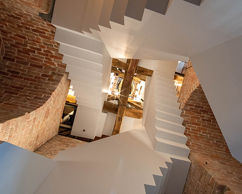 MX13 adds minimalistic staircase to medieval church tower in the netherlands