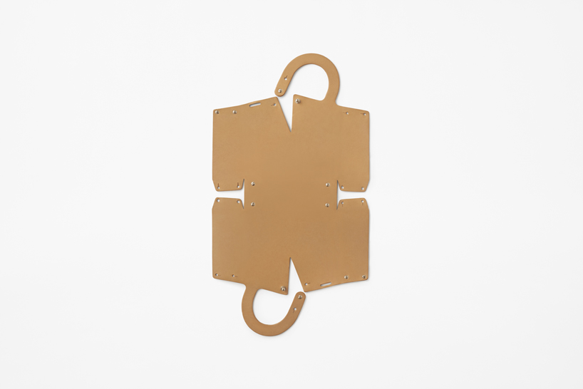 nendo designs 'flatpack' handbag made from a single piece of leather