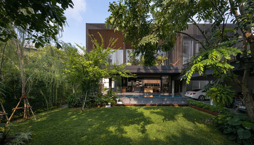 octane's k krit residence in bangkok is clad in façade of black unequal ...