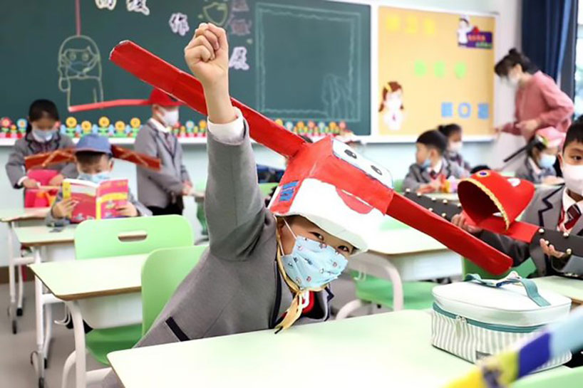 children in china make social-distancing hats inspired by ancient headwear