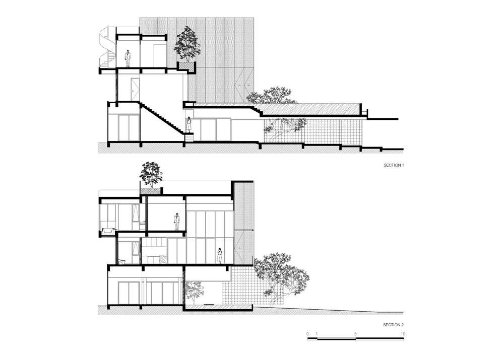 ayutt and associates design places aluminum-clad house within natural ...