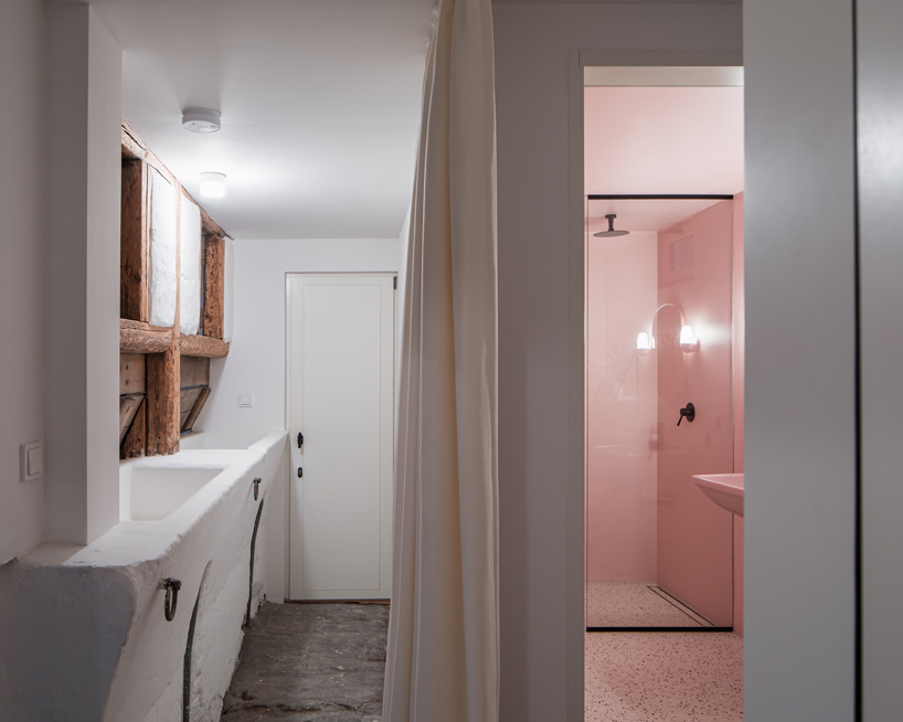 sigurd larsen sets dortmannhof house inside 200-year-old barn in western germany
