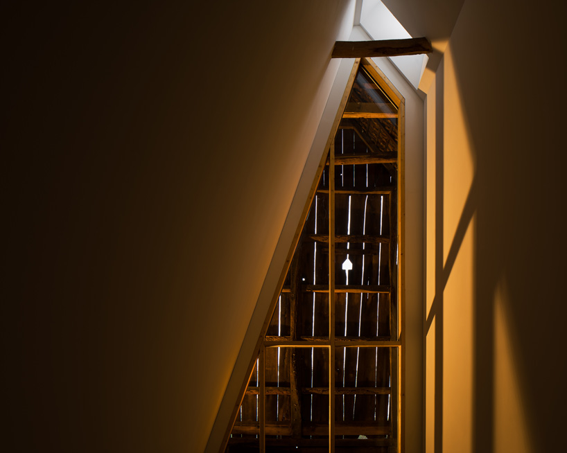 sigurd larsen sets dortmannhof house inside 200-year-old barn in western germany