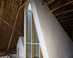 sigurd larsen sets dortmannhof house inside 200-year-old barn in western germany