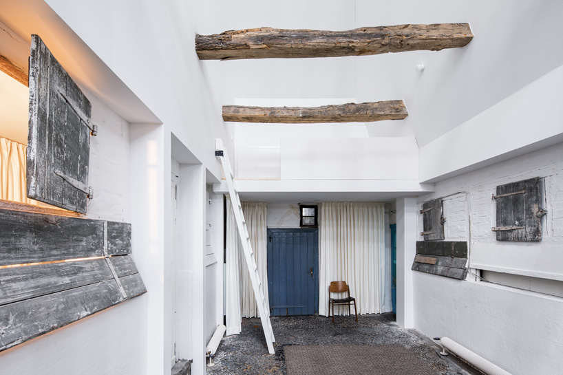 sigurd larsen sets dortmannhof house inside 200-year-old barn in western germany