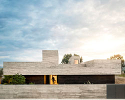spaceworkers designs a 'house for books' with a monolithic roof in rural portugal