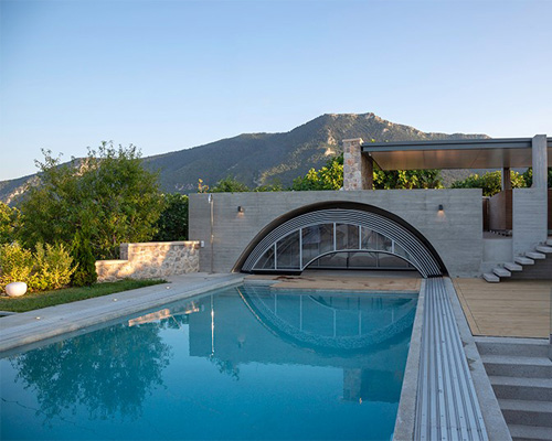 swimming pool in mountainous central greece follows design principles of old cisterns