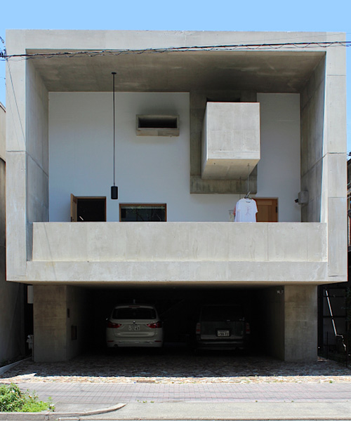 tomoaki uno architects builds concrete cuboid house with protruding balconies in japan
