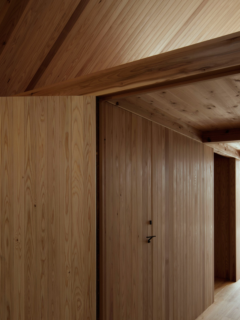 tomoaki uno architects completes wooden house in japan with blind street façade
