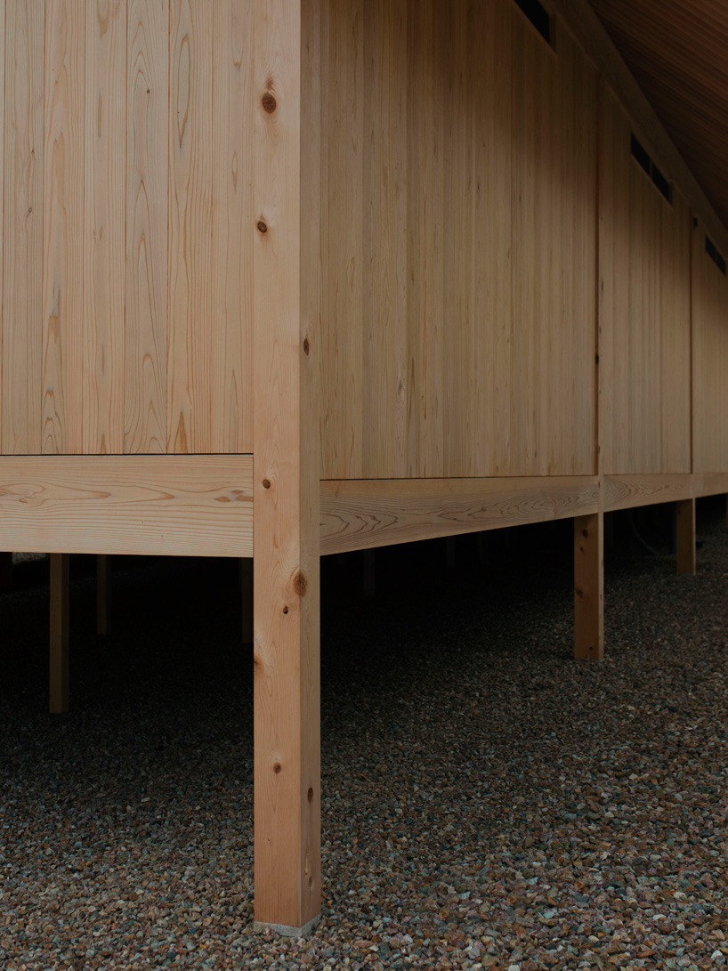 tomoaki uno architects completes wooden house in japan with blind street façade